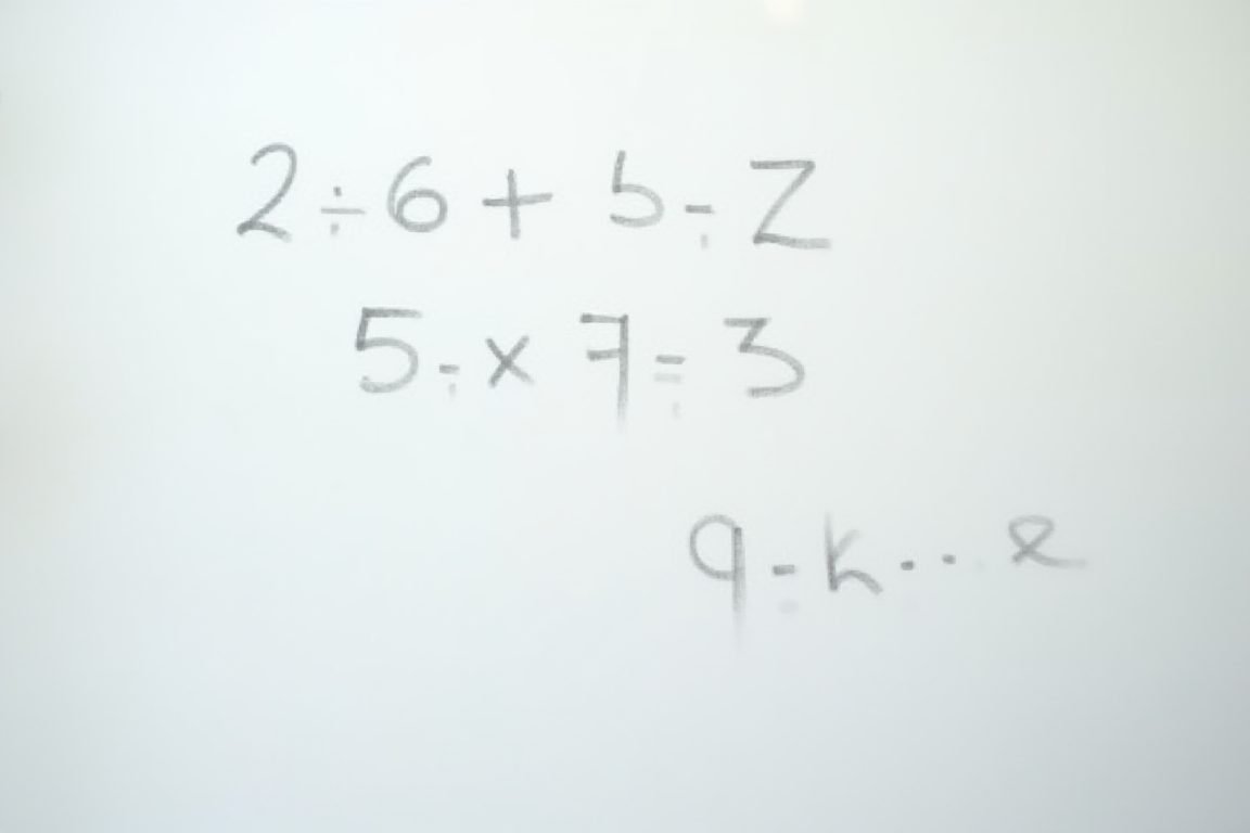 A whiteboard covered in math steps being erased by an unseen hand, symbolizing hidden reasoning